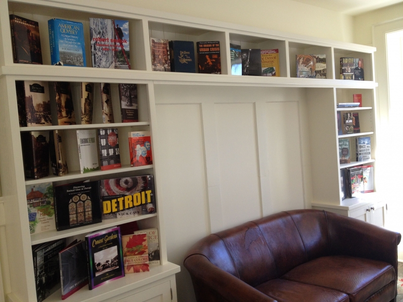 Stocked bookshelves in the parlor