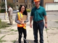Joe Gallagher with Ana Navarrete, an engineer with Giffels Webster, who is helping with the design of the alley behind the building.