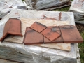 Roof tiles that will be reused for the roof of our greenhouse.