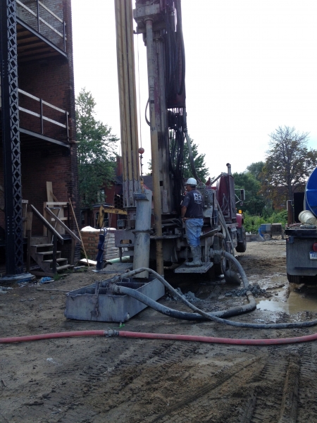 Drilling one of the 8 geothermal wells that will provide heating and cooling for the building.