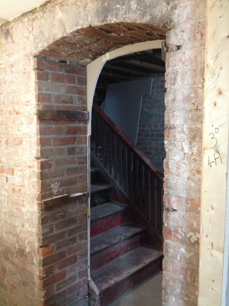 Arched doorway in basement