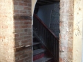Arched doorway in basement