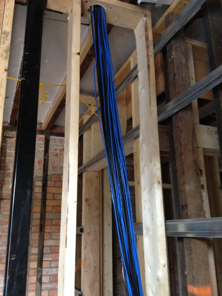 These are Cat-5e Ethernet cables that will run to each apartment as well as locations on each floor for wireless access points.