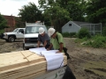DetMet Carpentry employees looking over plans.