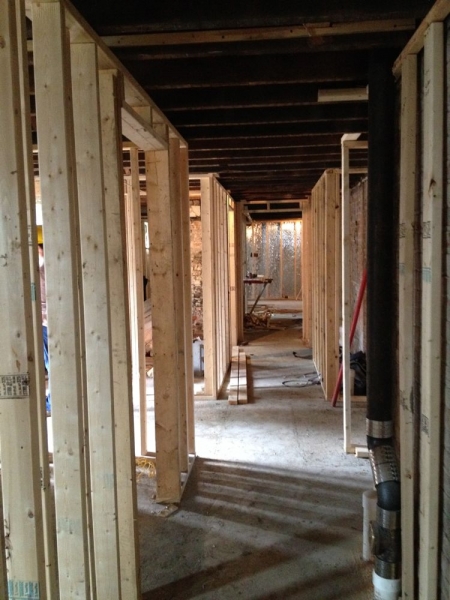 An early peek at a hallway in the basement. The basement will have 2 hostel rooms, a laundry room, and a storage room.