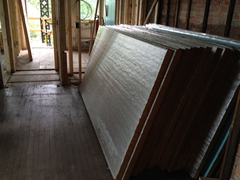 Stack of rigid board insulation.