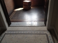 Repurposed flooring in a hallway.jpg