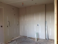 Drywall in a master bedroom.